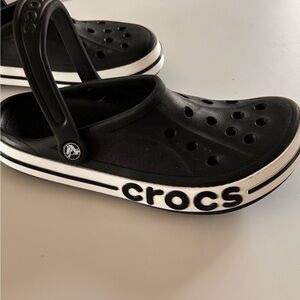 Crocs, Size 9, Excellent Condition. Perfect for casual outings.
